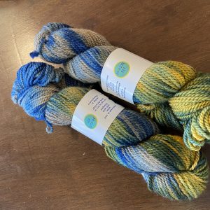 Blue, yellow, and white DK weight Alpaca yarn