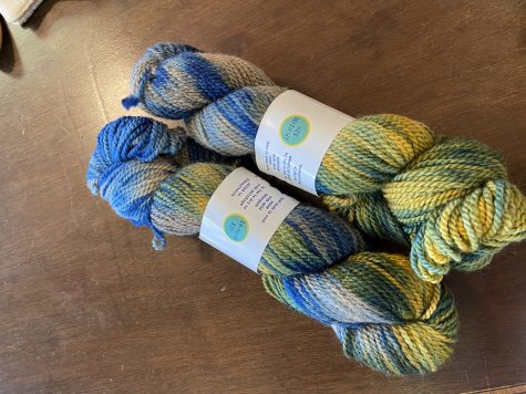 Blue, yellow, and white DK weight Alpaca yarn