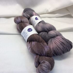 Black, purple, and grey dyed fingering weight Alpaca yarn