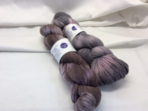 Black, purple, and grey dyed fingering weight Alpaca yarn